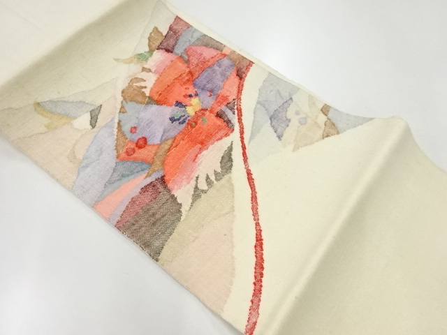 アンティーク　手織真綿紬草花に抽象模様織出し名古屋帯